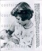 1960-Britains-Princess-Anne-Holds-Baby-Prince-Andrew.jpg
