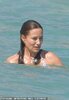 22681188-7828107-Pippa_smiled_as_she_basked_in_the_warm_water_of_the_Caribbean_to-a-73_1577388...jpg