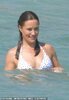 22681190-7828107-Pippa_smiled_as_she_basked_in_the_warm_water_of_the_Caribbean_to-a-72_1577388...jpg