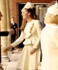 The Duchess of Cambridge (Kate Middleton) kiss his grandfather in law, Prince Philip.gif