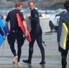 ONE USE ONLY (£250 per reuse) - Prince William and Prince Harry on the beach surfing in Cornw...jpeg