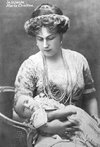 Queen Victoria Eugenie of Spain holding her daughter, Infanta Maria Cristina of Spain.jpg