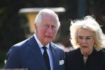 41788976-9474131-The_Prince_of_Wales_appears_emotional_as_he_views_the_tributes_w-a-129_161848...jpg