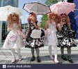 japanese-women-dressed-in-lolita-fashion-walk-in-front-of-the-venue-of-the-individual-fashion-...jpg