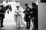 Princess Anne with her father Prince Philip at her first wedding November 1973.jpg