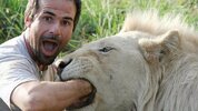 Kevin Richardson with one of his lions in South Africa.jpg