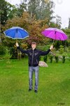 young-man-with-two-umbrellas-725801.jpg