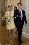 59982991-10990821-Princess_Charlotte_opted_for_a_floral_yellow_and_white_mini_dres-a-169_16572...jpg