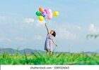 small-girl-holding-air-balloons-260nw-1089326063.jpg