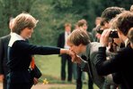 Schoolboy Nicholas Hardy kisses Lady Diana Spencer.jpg