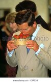 prince-charles-smelling-a-basket-of-strawberries-C4AC54.jpg