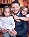 King Abdullah II of Jordan with his daughters Salma and Iman.jpg