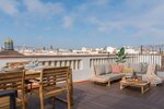 terraza-en-barcelona-urbana-con-muebles-de-madera_54f4e47a_230601152423_2000x1333.jpg
