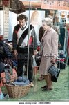 the-queen-elizabeth-ii-9th-may-1991-the-queen-browsing-through-a-stall-bw2dmd.jpg