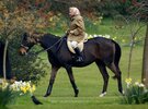Elizabeth rides her horse in the grounds of Windsor Castle on April 2, 2002 (2).jpg