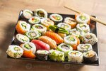 assortment-of-japanese-sushi-rolls-nigiri-sashimi-and-maki-photo.jpg