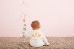 Marie-Chantal-AW15-angel-wing-baby-with-mobile-back.jpg