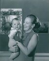 vintage-photo-of-margrethe-ii-of-denmark-carrying-her-baby-ad18f93eaf12ef9837759da8e535b292.jpg