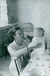 vintage-photo-of-margrethe-of-denmark-holding-child-011a3c69161fe4793e2949505ff83407.jpg