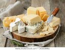 delicious-cheese-on-table-450w-343034981.jpg