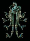 Broche-con-forma-de-cabezas-de-serpiente-diseñado-por-René-Lalique.jpg